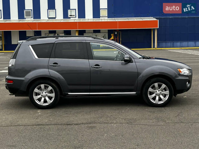 Серый Мицубиси Аутлендер, объемом двигателя 2.2 л и пробегом 206 тыс. км за 11999 $, фото 8 на Automoto.ua