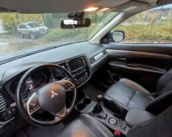 Серый Мицубиси Аутлендер, объемом двигателя 2.27 л и пробегом 232 тыс. км за 12500 $, фото 14 на Automoto.ua