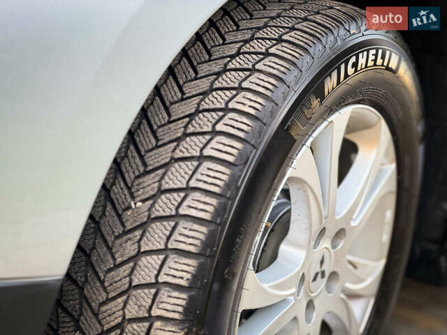 Серый Мицубиси Аутлендер, объемом двигателя 2.2 л и пробегом 189 тыс. км за 12800 $, фото 14 на Automoto.ua