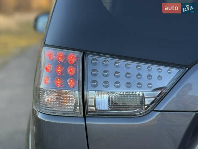 Серый Мицубиси Аутлендер, объемом двигателя 2.2 л и пробегом 171 тыс. км за 12700 $, фото 25 на Automoto.ua