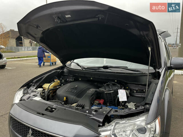 Серый Мицубиси Аутлендер, объемом двигателя 2.2 л и пробегом 206 тыс. км за 11999 $, фото 38 на Automoto.ua