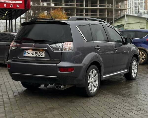 Серый Мицубиси Аутлендер, объемом двигателя 2.3 л и пробегом 160 тыс. км за 13900 $, фото 6 на Automoto.ua