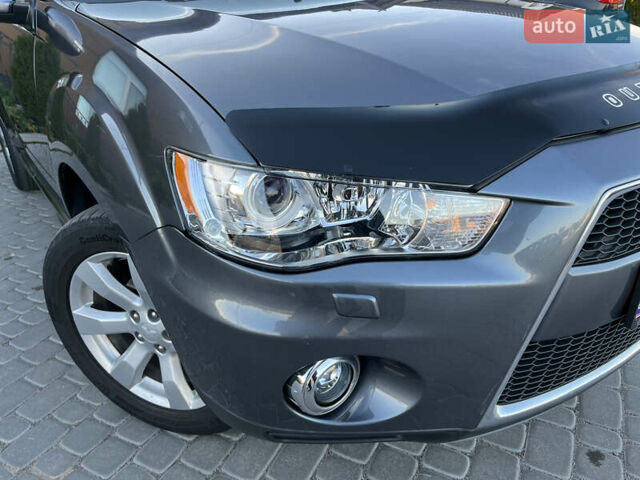 Серый Мицубиси Аутлендер, объемом двигателя 2.2 л и пробегом 186 тыс. км за 12350 $, фото 16 на Automoto.ua