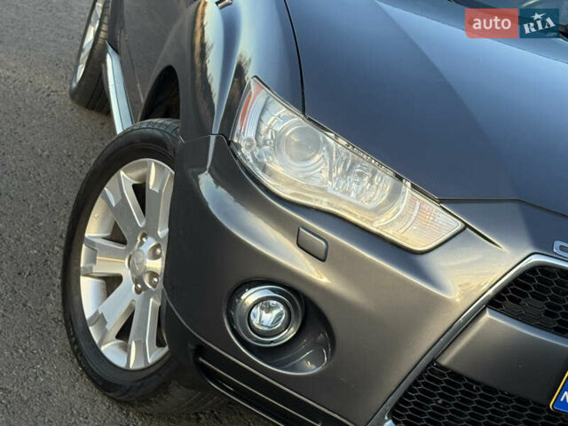 Серый Мицубиси Аутлендер, объемом двигателя 2.2 л и пробегом 171 тыс. км за 12700 $, фото 10 на Automoto.ua