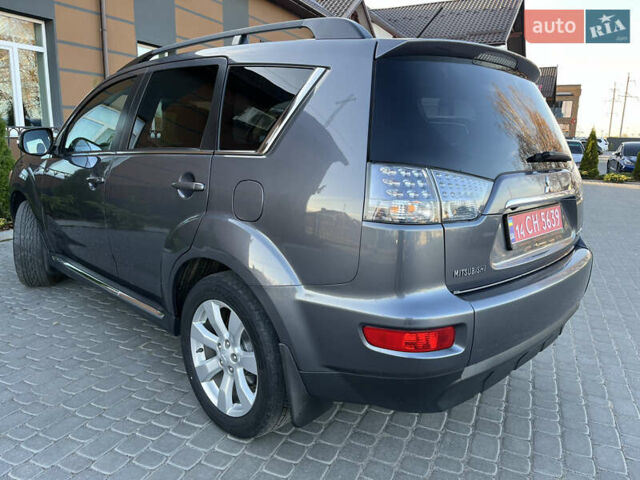Серый Мицубиси Аутлендер, объемом двигателя 2.2 л и пробегом 186 тыс. км за 12350 $, фото 25 на Automoto.ua