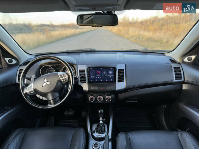 Серый Мицубиси Аутлендер, объемом двигателя 2.2 л и пробегом 171 тыс. км за 12700 $, фото 82 на Automoto.ua