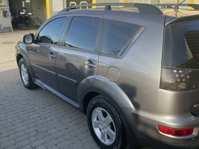 Серый Мицубиси Аутлендер, объемом двигателя 2 л и пробегом 136 тыс. км за 14999 $, фото 13 на Automoto.ua