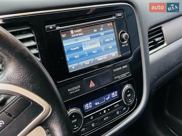 Серый Мицубиси Аутлендер, объемом двигателя 2.36 л и пробегом 131 тыс. км за 11800 $, фото 5 на Automoto.ua