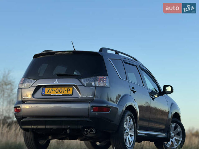 Серый Мицубиси Аутлендер, объемом двигателя 2.2 л и пробегом 171 тыс. км за 12700 $, фото 42 на Automoto.ua