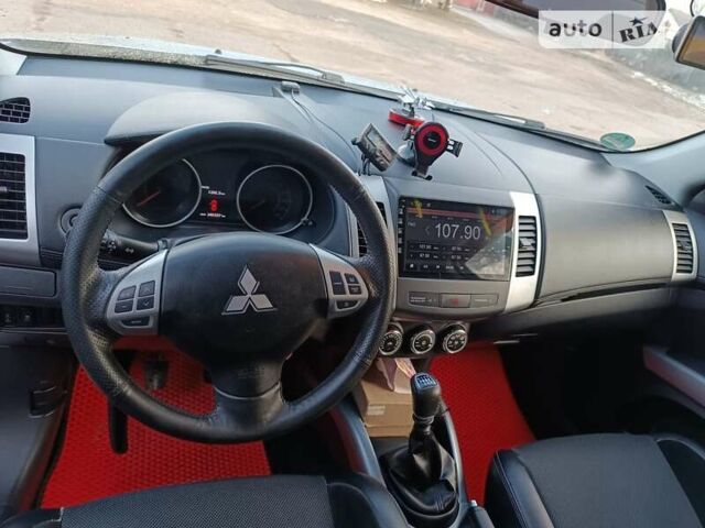 Мицубиси Аутлендер 2012 в Стрые на Automoto.ua Серый Мицубиси Аутлендер, объемом двигателя 2.3 л и пробегом 246 тыс. км за 12200 $, фото 10 на Automoto.ua