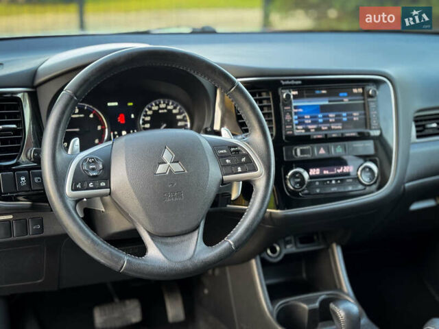 Серый Мицубиси Аутлендер, объемом двигателя 2.2 л и пробегом 189 тыс. км за 12800 $, фото 36 на Automoto.ua