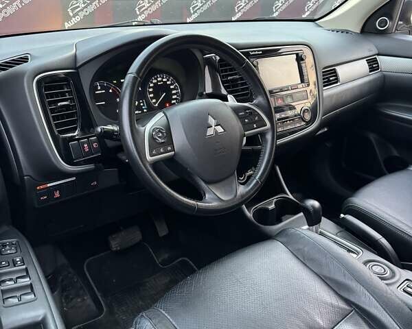 Серый Мицубиси Аутлендер, объемом двигателя 2.2 л и пробегом 190 тыс. км за 14950 $, фото 23 на Automoto.ua