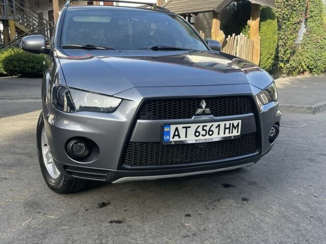 Серый Мицубиси Аутлендер, объемом двигателя 2 л и пробегом 136 тыс. км за 14999 $, фото 6 на Automoto.ua