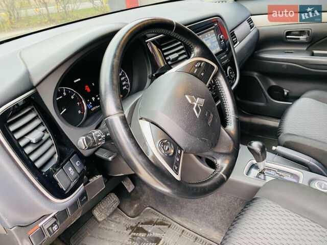 Серый Мицубиси Аутлендер, объемом двигателя 2.36 л и пробегом 131 тыс. км за 11800 $, фото 19 на Automoto.ua