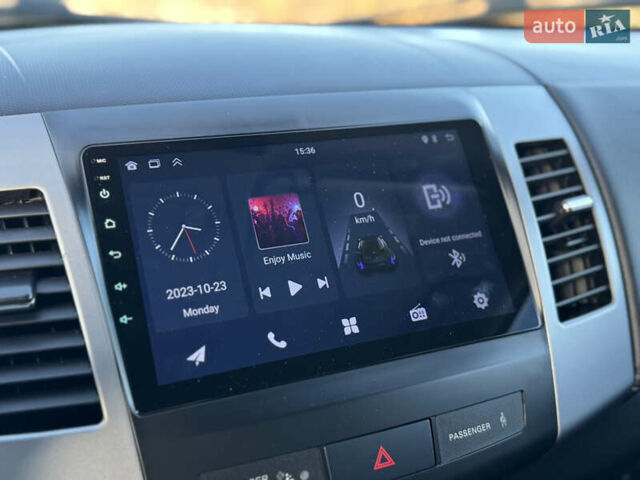 Серый Мицубиси Аутлендер, объемом двигателя 2.2 л и пробегом 171 тыс. км за 12700 $, фото 62 на Automoto.ua