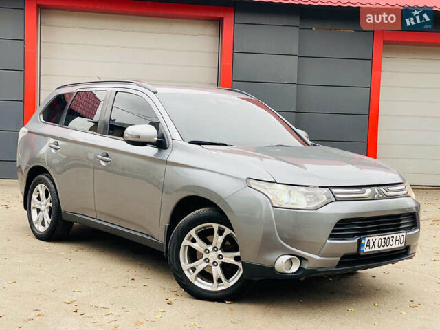 Серый Мицубиси Аутлендер, объемом двигателя 2.36 л и пробегом 131 тыс. км за 11800 $, фото 8 на Automoto.ua