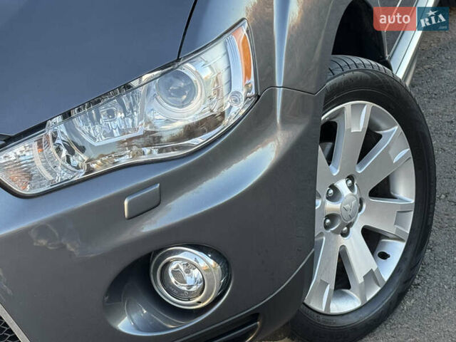 Серый Мицубиси Аутлендер, объемом двигателя 2.2 л и пробегом 171 тыс. км за 12700 $, фото 6 на Automoto.ua