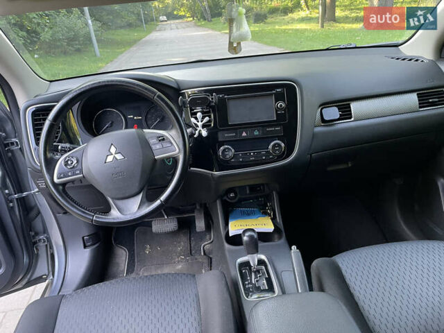 Серый Мицубиси Аутлендер, объемом двигателя 2.4 л и пробегом 150 тыс. км за 10750 $, фото 9 на Automoto.ua