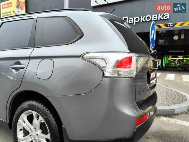 Серый Мицубиси Аутлендер, объемом двигателя 2.4 л и пробегом 209 тыс. км за 10990 $, фото 15 на Automoto.ua
