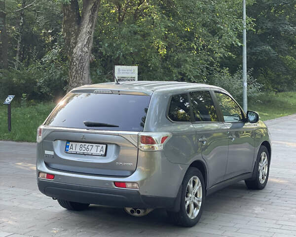 Серый Мицубиси Аутлендер, объемом двигателя 2.4 л и пробегом 150 тыс. км за 10750 $, фото 5 на Automoto.ua