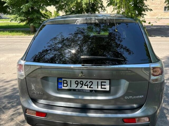 Сірий Міцубісі Аутлендер, об'ємом двигуна 2.4 л та пробігом 200 тис. км за 271 $, фото 1 на Automoto.ua