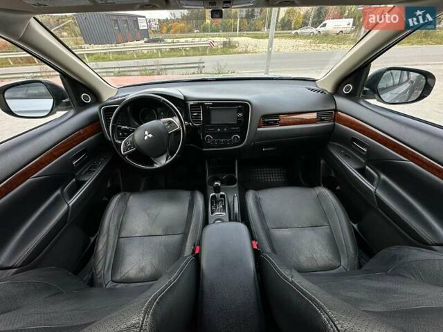 Серый Мицубиси Аутлендер, объемом двигателя 2.4 л и пробегом 228 тыс. км за 13999 $, фото 16 на Automoto.ua