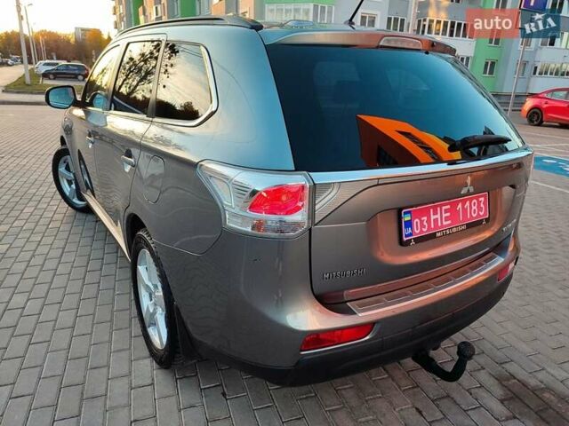 Серый Мицубиси Аутлендер, объемом двигателя 2.3 л и пробегом 250 тыс. км за 13999 $, фото 102 на Automoto.ua
