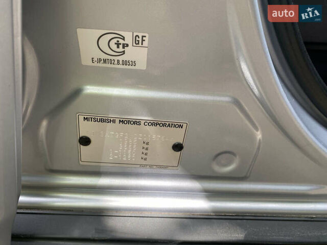 Серый Мицубиси Аутлендер, объемом двигателя 2 л и пробегом 203 тыс. км за 10999 $, фото 21 на Automoto.ua