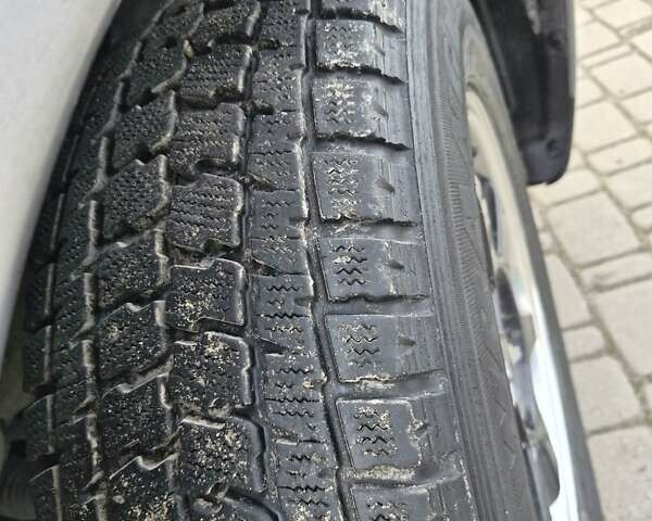 Сірий Міцубісі Аутлендер, об'ємом двигуна 2.4 л та пробігом 228 тис. км за 13500 $, фото 38 на Automoto.ua