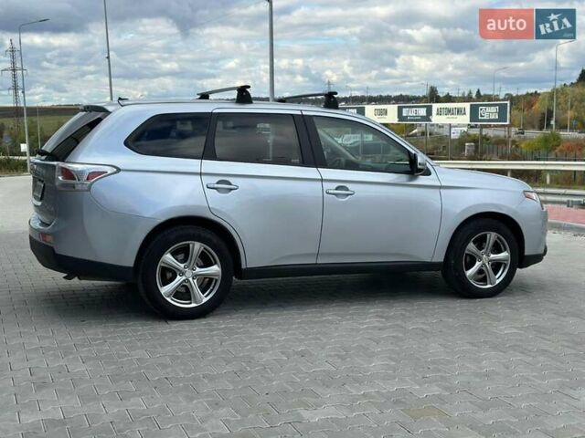 Серый Мицубиси Аутлендер, объемом двигателя 2.4 л и пробегом 228 тыс. км за 13999 $, фото 28 на Automoto.ua