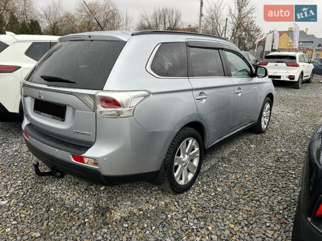Серый Мицубиси Аутлендер, объемом двигателя 2.2 л и пробегом 243 тыс. км за 13850 $, фото 12 на Automoto.ua