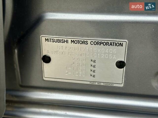 Сірий Міцубісі Аутлендер, об'ємом двигуна 2.3 л та пробігом 207 тис. км за 13700 $, фото 65 на Automoto.ua