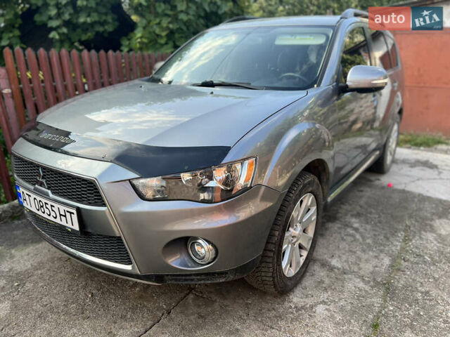 Серый Мицубиси Аутлендер, объемом двигателя 2.4 л и пробегом 278 тыс. км за 11300 $, фото 2 на Automoto.ua