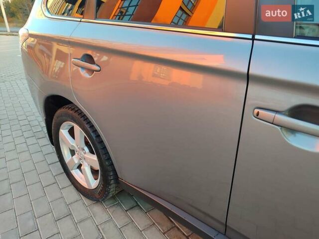 Серый Мицубиси Аутлендер, объемом двигателя 2.3 л и пробегом 250 тыс. км за 13499 $, фото 5 на Automoto.ua