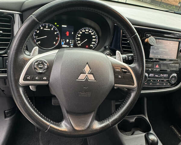 Сірий Міцубісі Аутлендер, об'ємом двигуна 2.36 л та пробігом 177 тис. км за 13499 $, фото 14 на Automoto.ua