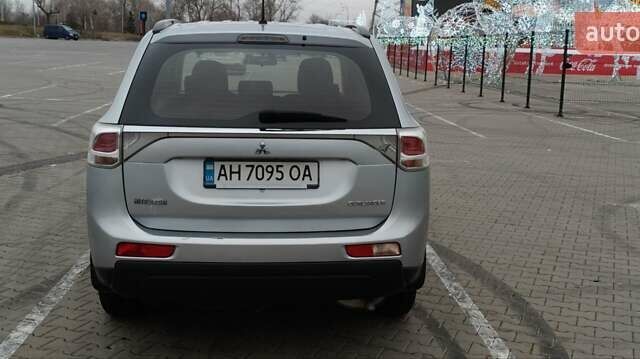 Сірий Міцубісі Аутлендер, об'ємом двигуна 2 л та пробігом 231 тис. км за 12200 $, фото 1 на Automoto.ua