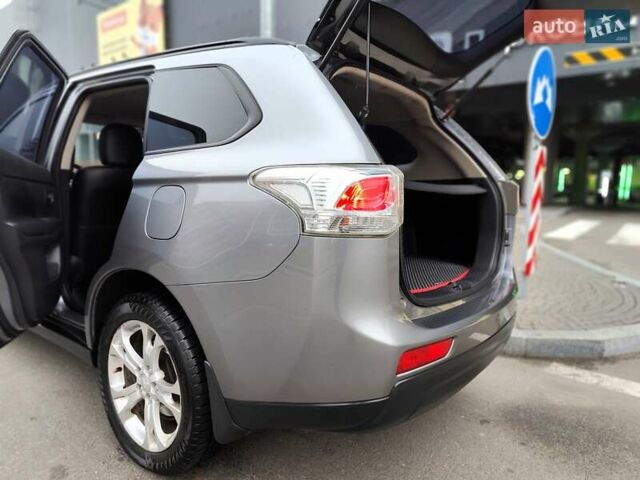Серый Мицубиси Аутлендер, объемом двигателя 2.4 л и пробегом 209 тыс. км за 10990 $, фото 14 на Automoto.ua