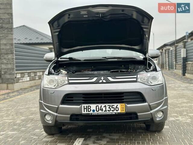 Сірий Міцубісі Аутлендер, об'ємом двигуна 2.3 л та пробігом 207 тис. км за 13700 $, фото 66 на Automoto.ua