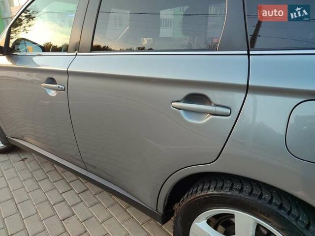 Серый Мицубиси Аутлендер, объемом двигателя 2.3 л и пробегом 250 тыс. км за 13999 $, фото 20 на Automoto.ua