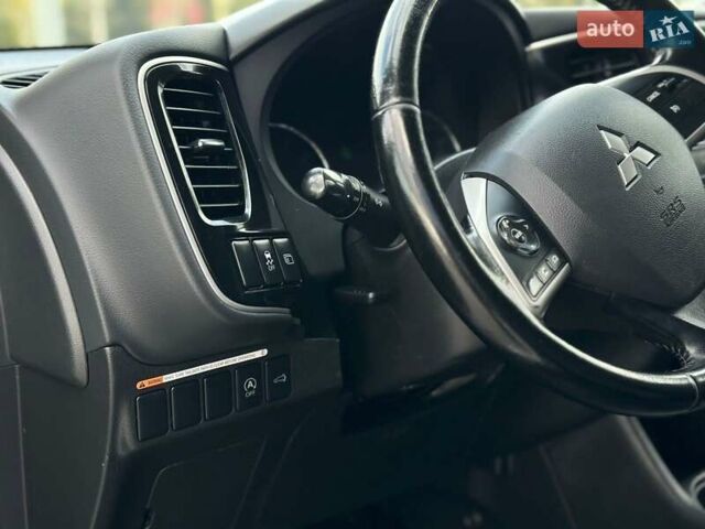 Серый Мицубиси Аутлендер, объемом двигателя 2.4 л и пробегом 228 тыс. км за 13999 $, фото 41 на Automoto.ua