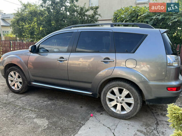 Серый Мицубиси Аутлендер, объемом двигателя 2.4 л и пробегом 278 тыс. км за 11300 $, фото 4 на Automoto.ua