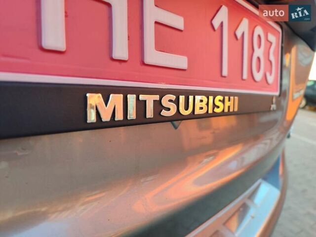 Серый Мицубиси Аутлендер, объемом двигателя 2.3 л и пробегом 250 тыс. км за 13499 $, фото 106 на Automoto.ua