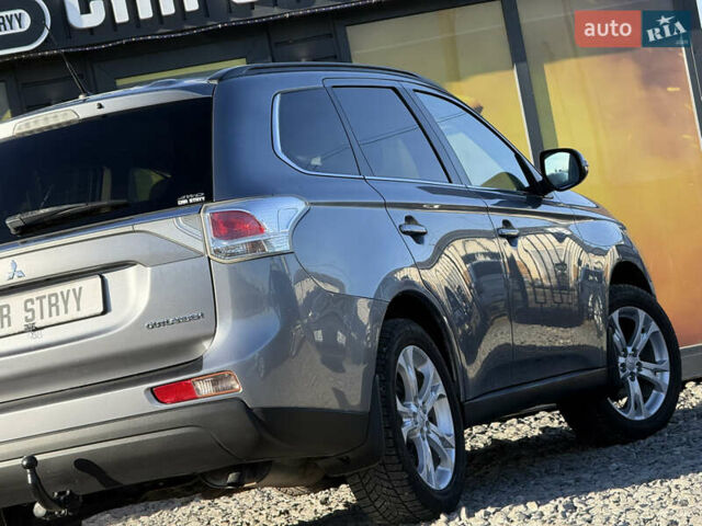 Серый Мицубиси Аутлендер, объемом двигателя 2.3 л и пробегом 193 тыс. км за 14500 $, фото 22 на Automoto.ua