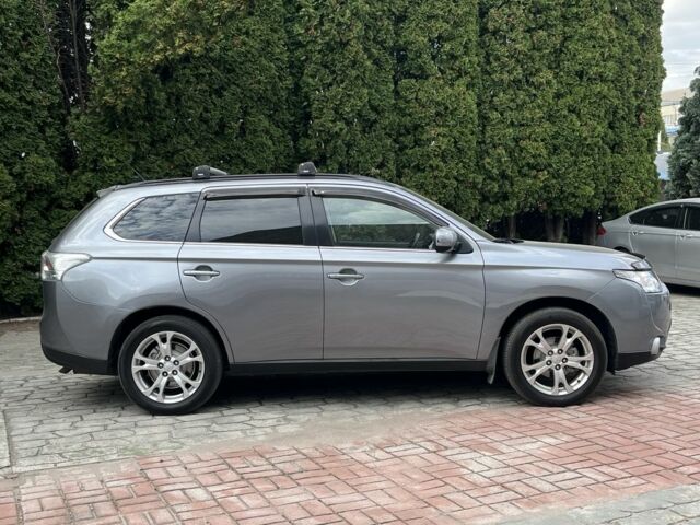 Серый Мицубиси Аутлендер, объемом двигателя 2.2 л и пробегом 239 тыс. км за 13800 $, фото 2 на Automoto.ua