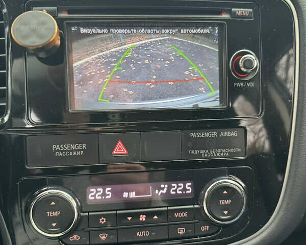 Сірий Міцубісі Аутлендер, об'ємом двигуна 2.36 л та пробігом 177 тис. км за 13499 $, фото 31 на Automoto.ua