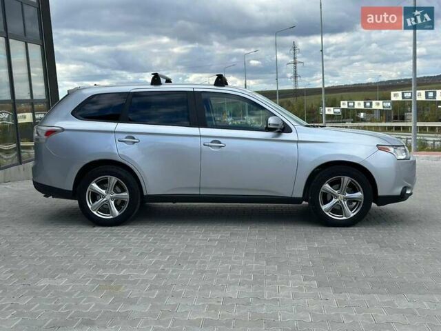 Серый Мицубиси Аутлендер, объемом двигателя 2.4 л и пробегом 228 тыс. км за 13999 $, фото 25 на Automoto.ua