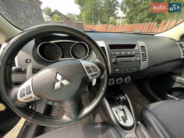 Серый Мицубиси Аутлендер, объемом двигателя 2.4 л и пробегом 278 тыс. км за 11300 $, фото 7 на Automoto.ua