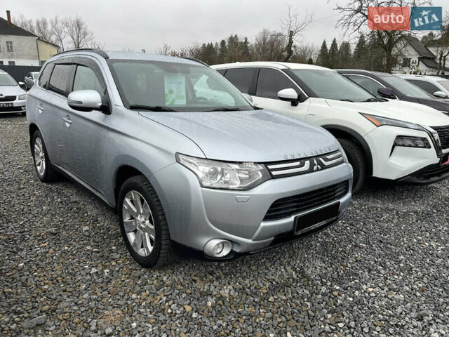 Серый Мицубиси Аутлендер, объемом двигателя 2.2 л и пробегом 243 тыс. км за 13850 $, фото 1 на Automoto.ua