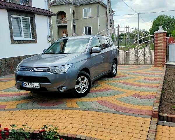 Серый Мицубиси Аутлендер, объемом двигателя 2.3 л и пробегом 250 тыс. км за 13500 $, фото 3 на Automoto.ua