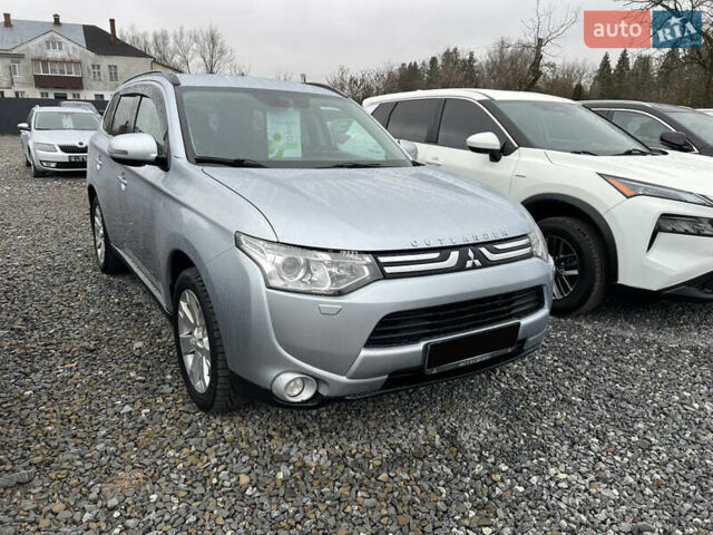 Серый Мицубиси Аутлендер, объемом двигателя 2.2 л и пробегом 243 тыс. км за 13850 $, фото 2 на Automoto.ua